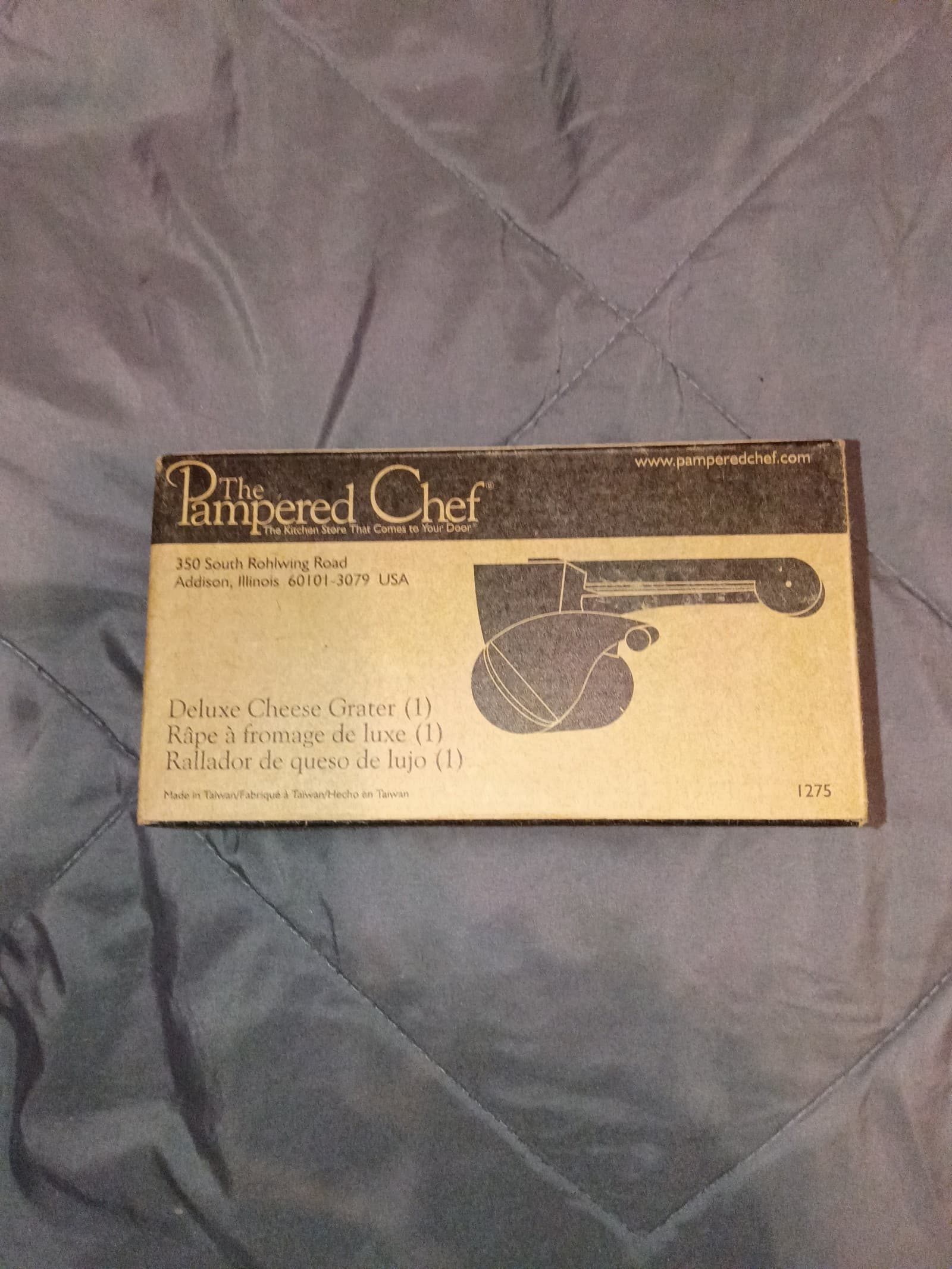 The Pampered chef deluxe cheese grater