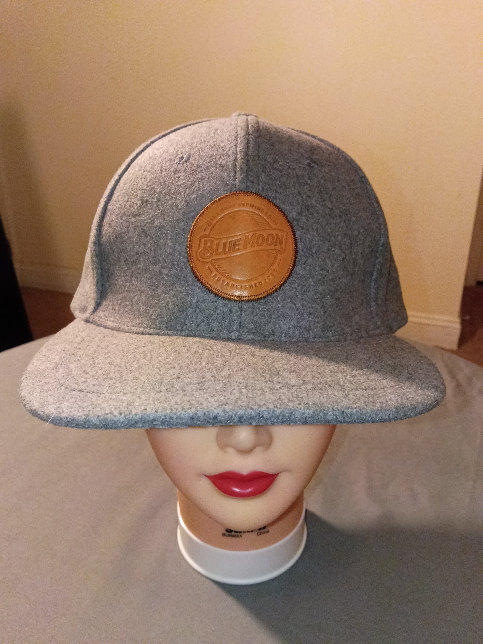 Blue Moon brewing company with leather logo wool hat