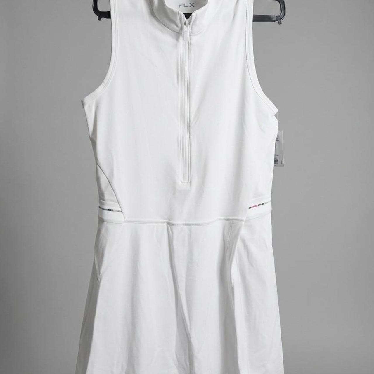 White FLX tennis dress with green trim #tennis #athletic and a small stain. new with tag
