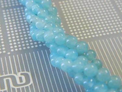 Sponge Quartz Beads: Soft Blue Glow - 4mm Round, 150 Pieces - Image 1